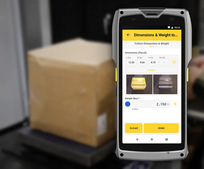 The M2 running a WorkFlows app: parcel dimensions 12.20 × 9.65 × 8.70 in, two photos and a 2.150 lb scale reading, with Clear and Send; a carton on a shipping scale behind